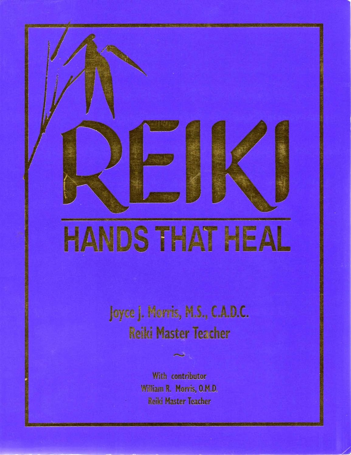 The purple front cover of a reiki book.